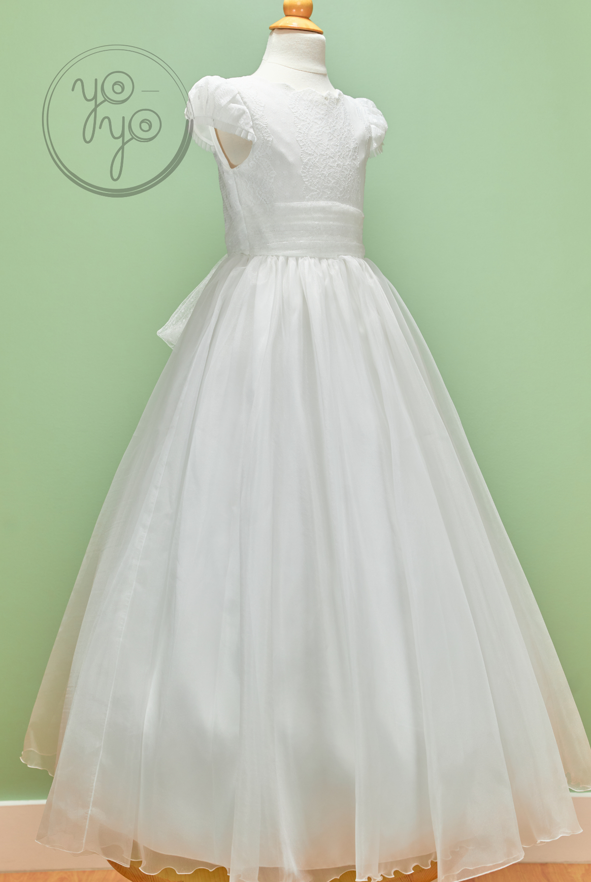 White sleeveless Iris Dress by YoYo Boutique with a lace bodice, ruffled cap sleeves, and a full embroidered tulle skirt.