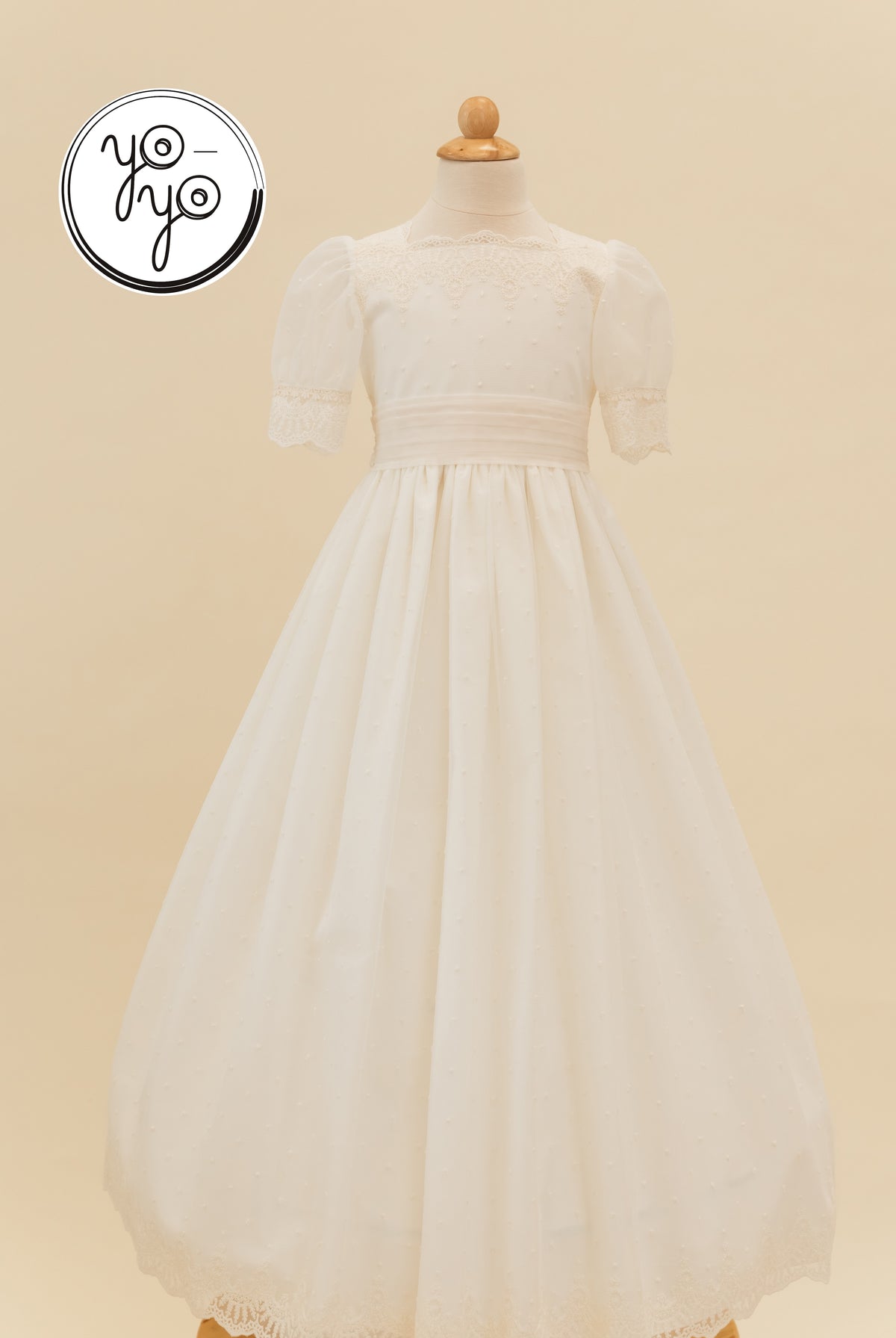 Sophie Dress in cream French tulle, featuring a square neckline, puffed sleeves, and delicate lace trim on the bodice and hem.