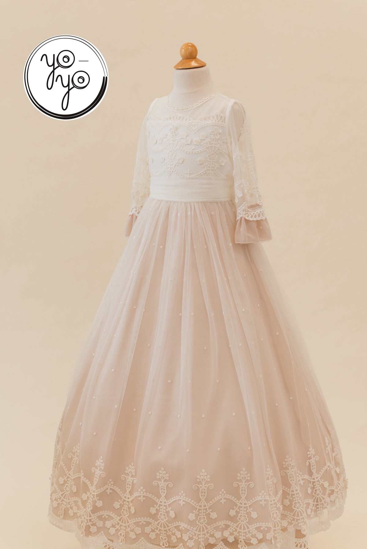 Lua Dress with a floor-length embroidered bodice, lace sleeves, and a dusty rose tulle skirt with white hem trim.