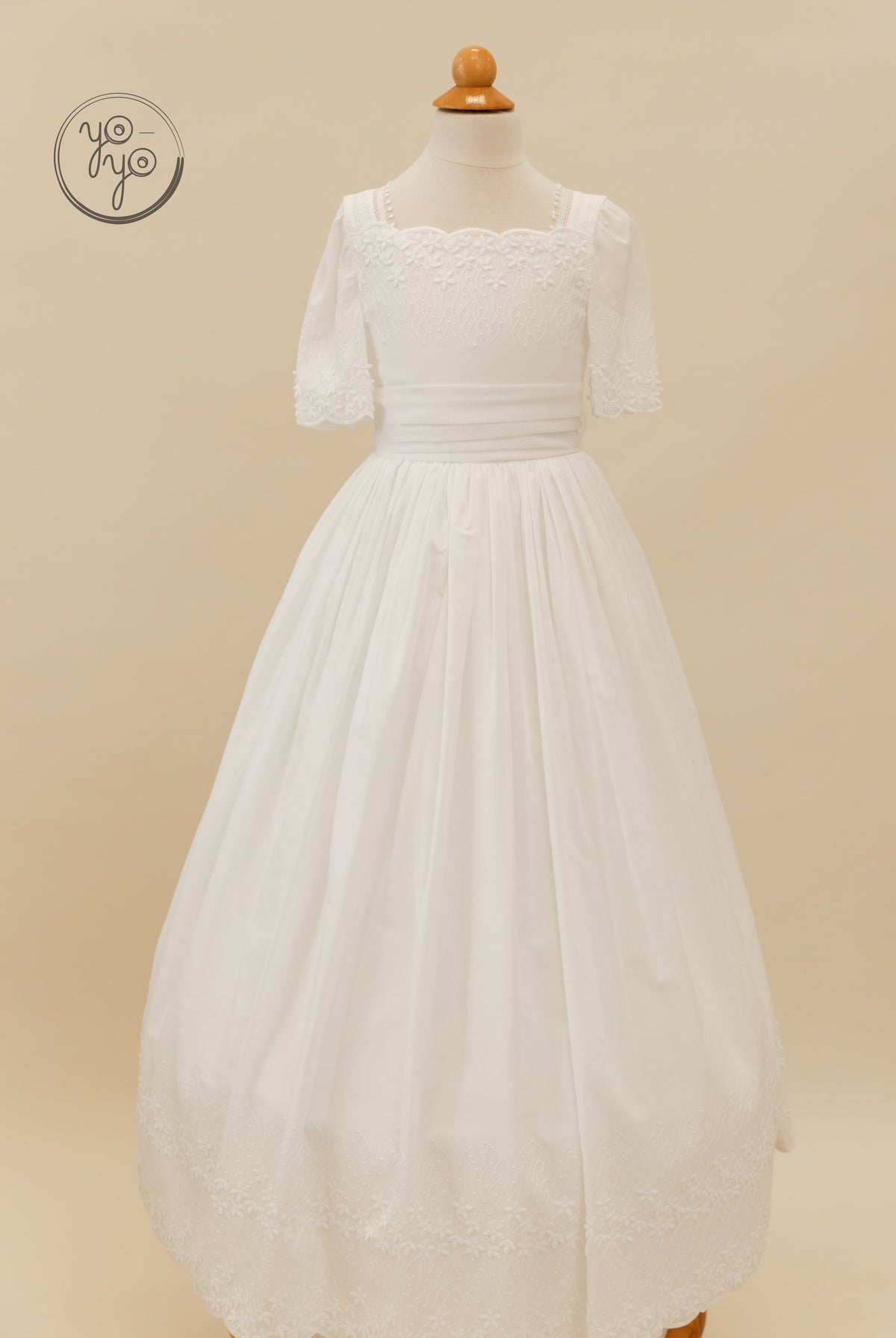 YoYo Boutique Salvia dress: a white floor-length boho dress with a square neckline, elbow-length sleeves, and floral embroidery.
