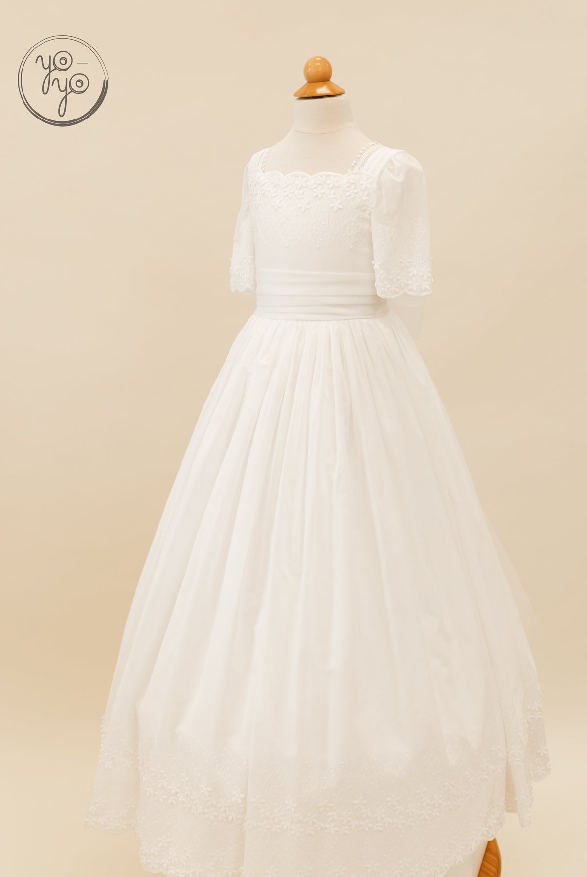 YoYo Boutique Salvia Dress: white floor-length boho-chic mannequin dress with square neckline, elbow-length sleeves, and floral embroidery.